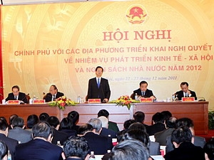 Thủ tướng Nguyễn Tấn Dũng phát biểu tại Hội nghị Chính phủ triển khai Nghị quyết của Quốc hội. (Ảnh: Đức Tám/TTXVN)