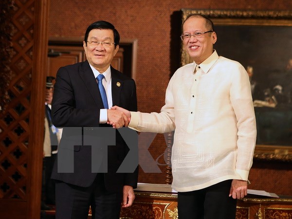 Tổng thống Philippines Benigno Aquino III hội đàm với Chủ tịch nước Trương Tấn Sang nhân dịp Hội nghị cấp cao APEC lần thứ 23. (Ảnh: Nguyễn Khang/TTXVN)