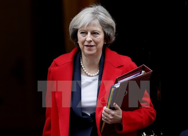 Thủ tướng Anh Theresa May tới dự phiên họp chất vấn tại Nghị viện ở London ngày 23-11. (Nguồn: AP/TTXVN)