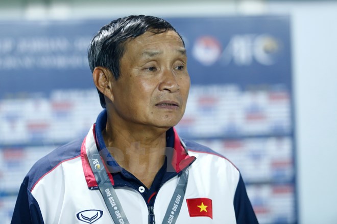 Huấn luyện viên Mai Đức Chung không lo lắng về cuộc đua hiệu số ở bảng D. (Ảnh: Minh Chiến/Vietnam+)