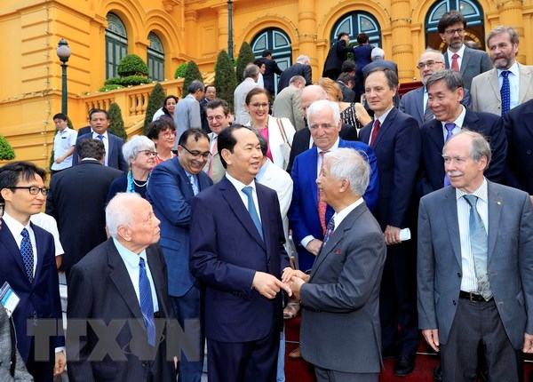  Chủ tịch nước Trần Đại Quang tiếp các nhà khoa học quốc tế nhân dịp sang Việt Nam dự Hội thảo Khoa học để phát triển. (Ảnh: Nhan Sáng/TTXVN)
