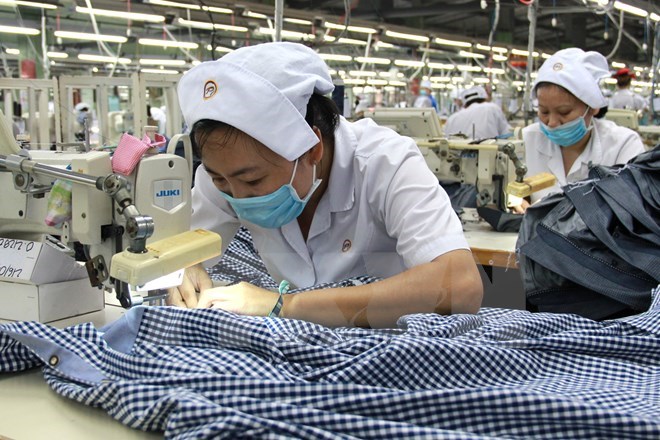 Trong 10 năm (2004-2014), hàng dệt may Việt Nam vào Hoa Kỳ tăng 398%, tốc độ tăng trưởng bình quân mỗi năm 15%. (Ảnh: Hải Âu/TTXVN)