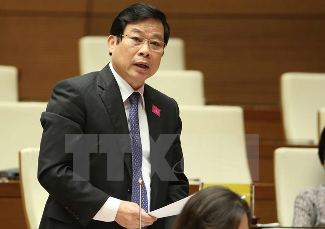 Bộ trưởng Bộ Thông tin và Truyền thông Nguyễn Bắc Son trả lời chất vấn của đại biểu Quốc hội. (Ảnh: Phương Hoa/TTXVN)