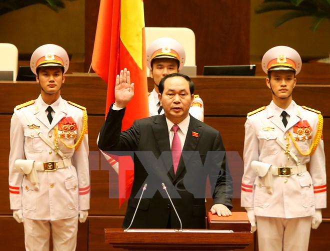 Chủ tịch nước Trần Đại Quang tuyên thệ nhậm chức. (Ảnh: Nhan Sáng/TTXVN)