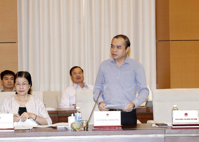 Phó Thống đốc Ngân hàng Nhà nước Nguyễn Đồng Tiến phát biểu. (Ảnh: Văn Điệp/TTXVN)