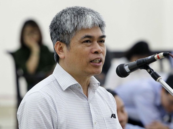 Bị cáo Nguyễn Xuân Sơn, nguyên Tổng giám đốc Oceanbank tự bào chữa tại phiên tòa. (Ảnh: Văn Điệp/TTXVN)