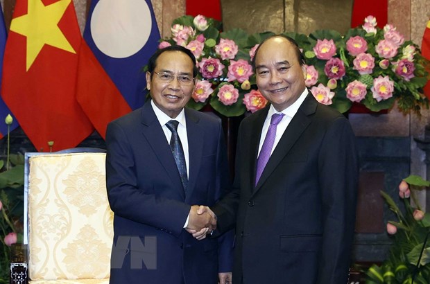 Chủ tịch nước: Tăng cường kết nối hai nền kinh tế Việt Nam-Lào